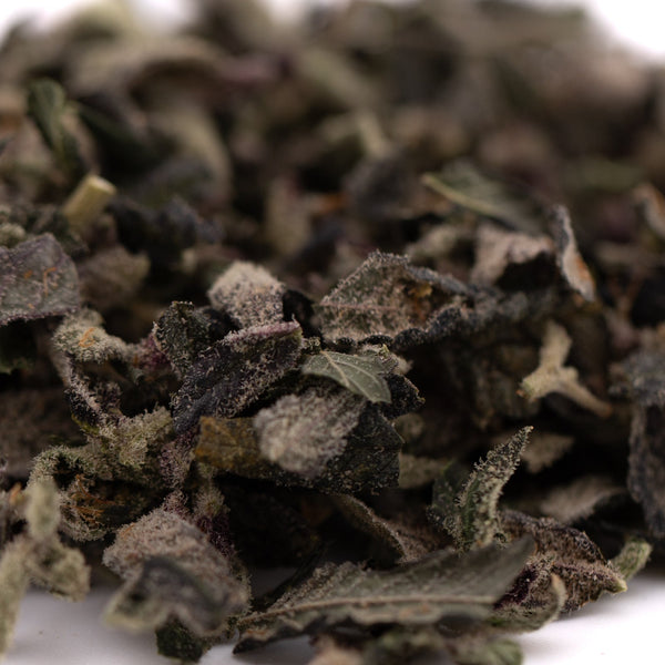 Pile of dried herbs for Candy Mac Indoor Trim Wholesale 1LB product display